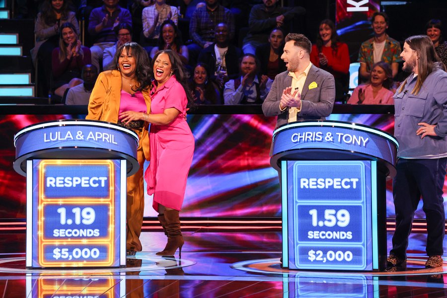 Two contestants celebrating a win on Beat Shazam